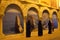 Three women in traditional arabian black robes