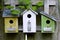 Three wooden birdhouses