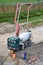 Three workers and concrete transport truck with concrete pump ready for use. This activity is related to railway reconstruction pr