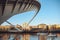 Three yachts sailing under the Millennium Bridge on River Tyne