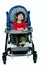 Three year old biracial disabled boy in medical stroller, happy