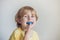 Three-year old boy shows myofunctional trainer to illuminate mouth breathing habit. Helps equalize the growing teeth and correct