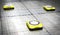 Three yellow autonomous robots, floor
