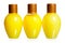 Three yellow bottles of cosmetics