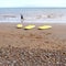 Three yellow kayaks