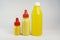Three Yellow plastic bottle antiseptic isolated on white background.