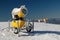 Three yellow snow guns