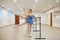 Three young ballerinas rehearsing at the barre