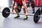 Three young Bodybuilders doing weightlifting