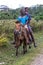 Three young boys on a horse in rural Carbo, Haiti.