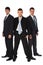 Three young businessmen stand semicircle