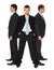 Three young businessmen stand semicircle