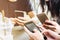 Three young friends on phone, social media with people at coffee shop