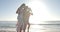 Three young women enjoy a sunny beach day