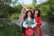 Three young women in traditional Bulgarian folklore costumes