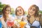 Three younger asian woman happiness  drinking beverage in waer swimming pool