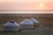 Three yurts on the shore of the Aral Sea