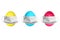 ThreeEaster colored eggs yelow blue and green colors with medical masks above isolated on a white background.