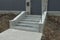 Threshold with gray concrete and stone steps