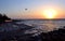 Thrilling sunset at sea, with a flaming sun, from the Nightcliff jetty. Darwin, Australia.