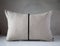 Throw pillow from gray linen with black decorative zipper sewn i
