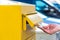 Throwing a letter in a yellow mailbox