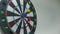 Throwing three darts into the target aim and missing a ten points circle. 4k UHD video