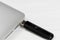 Thumb drive plugged into laptop computer