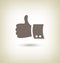 Thumb up gesture. Good icon hand on beige