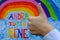 Thumb-up next to a positive message -Everything will be okay- rainbow colors for encouraging people in time of pandemic.hand with