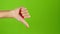 Thumbs down female hand on green screen background. Sign language