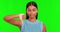 Thumbs down, green screen and face of woman with no sign, shake head or bad review in studio. Portrait, hand and indian