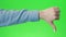 Thumbs down sign hand gesture on green screen. Simbol of disapproval dislike negative emotion.