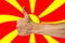 Thumbs up on a background of a flag of Macedonia
