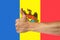 Thumbs up on a background of a flag of Moldova