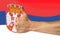 Thumbs up on a background of a flag of Serbia