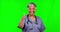 Thumbs up, doctor woman and green screen for healthcare success, yes and like or hospital support and thank you. Happy