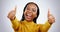 Thumbs up, excited black woman and portrait in studio for success, winning deal and achievement on white background