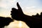 Thumbs up gesture sign of best choice approve and accept. Top places to visit in evening. Silhouette thumb up gesture in