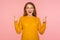 Thumbs up! Portrait of attractive cheerful ginger girl in sweater doing like gesture with finger up, expressing approval