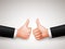 Thumbs Up Sign of Two Professional Businessman Hands for Agreements
