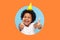 Thumbs up to birthday party! Excited amazing joyful boy with funny cone on head showing like