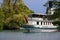 THUN, Switzerland, August 8, 2022: Tourists on the board of a touristic ship entering in Thun harbour, Switzerland