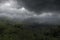 Thunder and lightning storm over deep valley and mountains