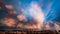 Thunderclouds on an epic dramatic stormy sky with lightning flashes over the city