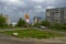 Thunderclouds over a poor sleeping district and dirt crossroads of city