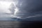 Thunderclouds and rain clouds over the coastline of the Strait of Juan de Fuca. Pacific Ocean.