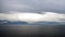 Thunderclouds and rain clouds over the coastline of the Strait of Juan de Fuca. Pacific Ocean.