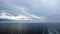 Thunderclouds and rain clouds over the coastline of the Strait of Juan de Fuca. Pacific Ocean.