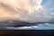 Thunderclouds and rain clouds over the coastline of the Strait of Juan de Fuca. Pacific Ocean.